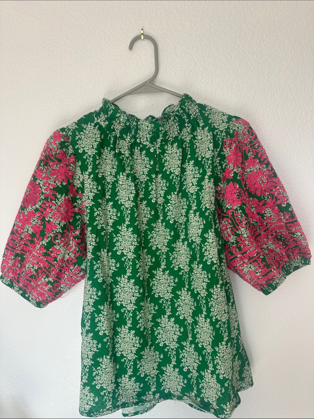 THML floral embroidered puff sleeve mock neck detail top!